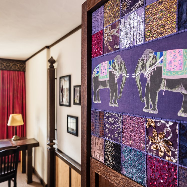 Cultural Details at Park-Hotel Hagenbeck – Colorful Elephant Art Meets Elegant Interior