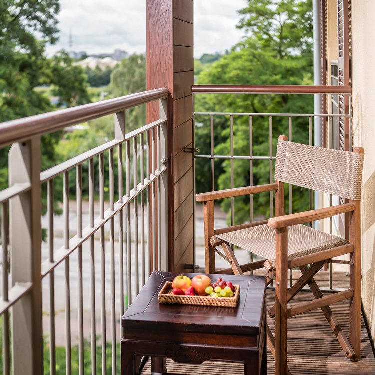 Private Balcony at Park-Hotel Hagenbeck – Relaxation with a View into Nature
